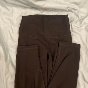 A little bit below knee length black legging super cute